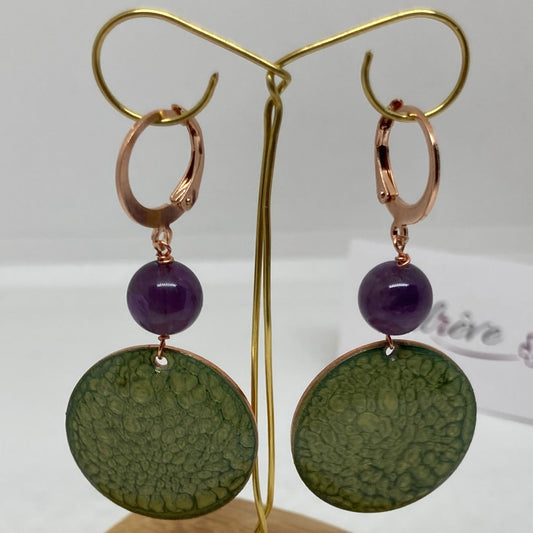 Copper pendant earrings embellished with amethyst beads.