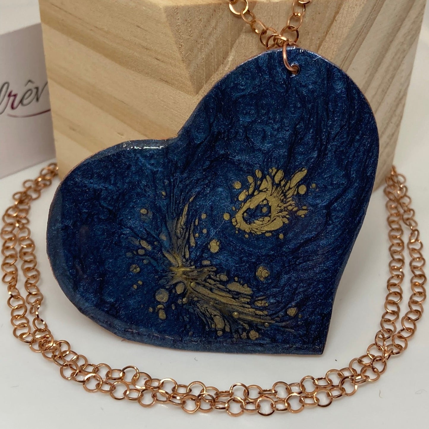 Copper necklace with square pendant, embellished with amethyst pearl.