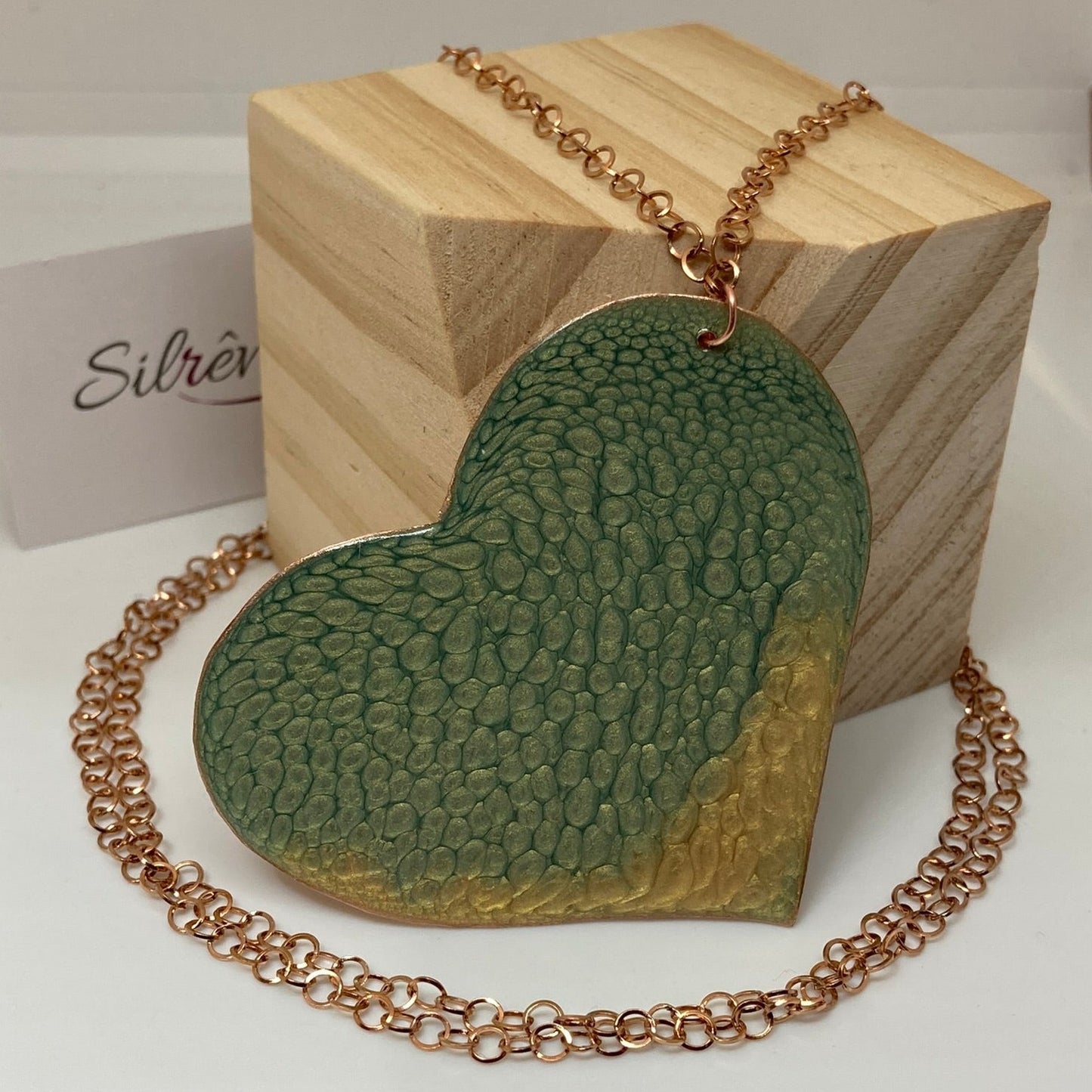 Copper necklace with square pendant, embellished with amethyst pearl.