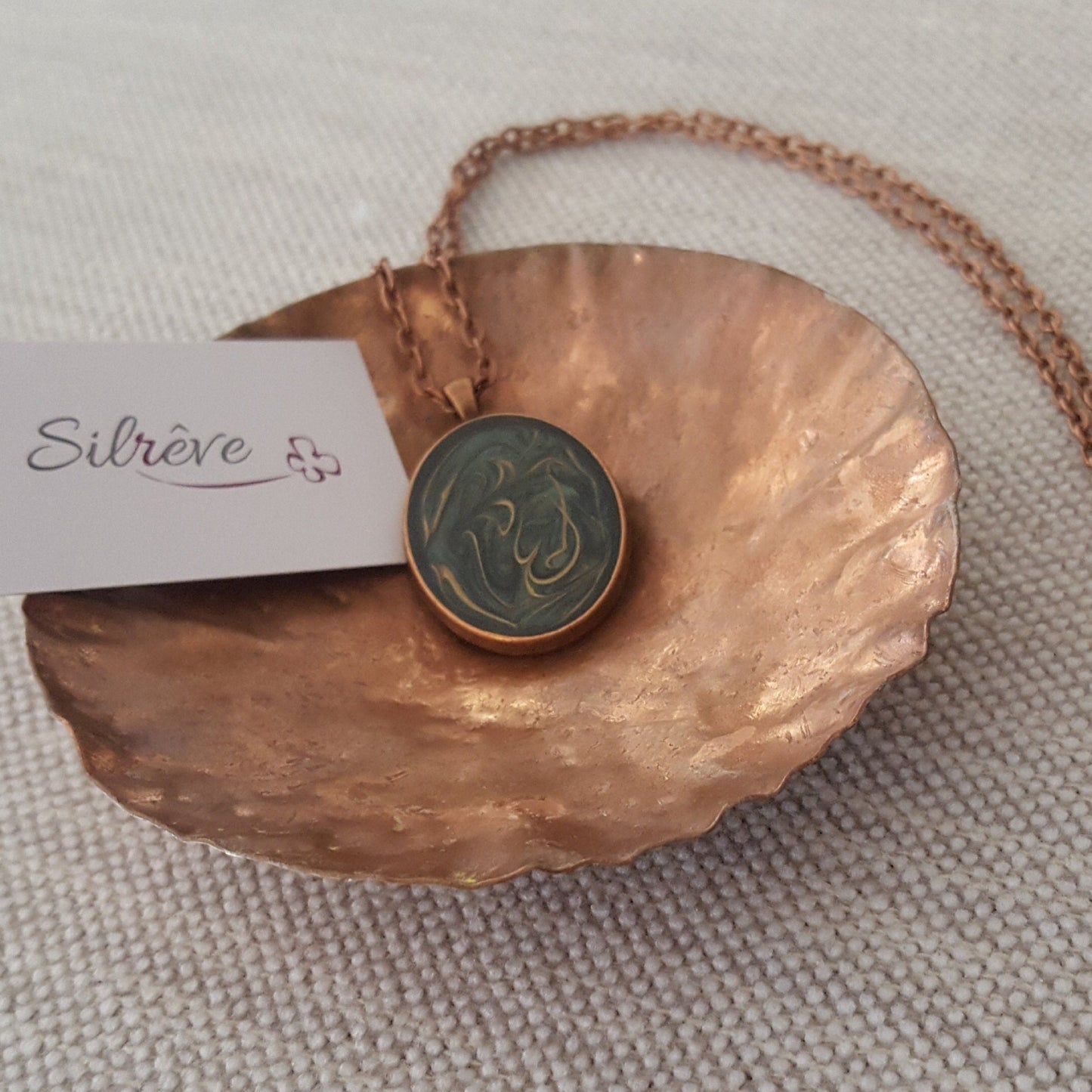 Copper necklace with hand painted and vitrified oval pendant.