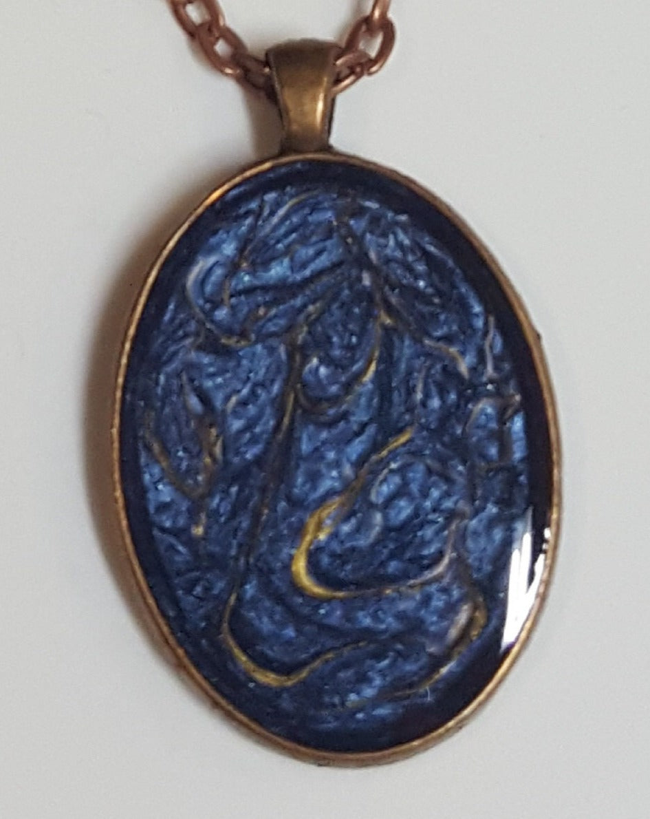 Copper necklace with hand painted and vitrified oval pendant.