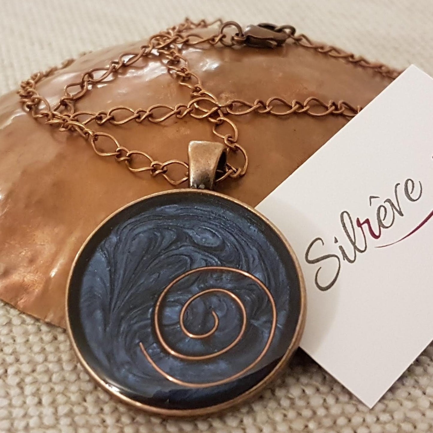 Copper necklace with round pendant, hand painted and vitrified.