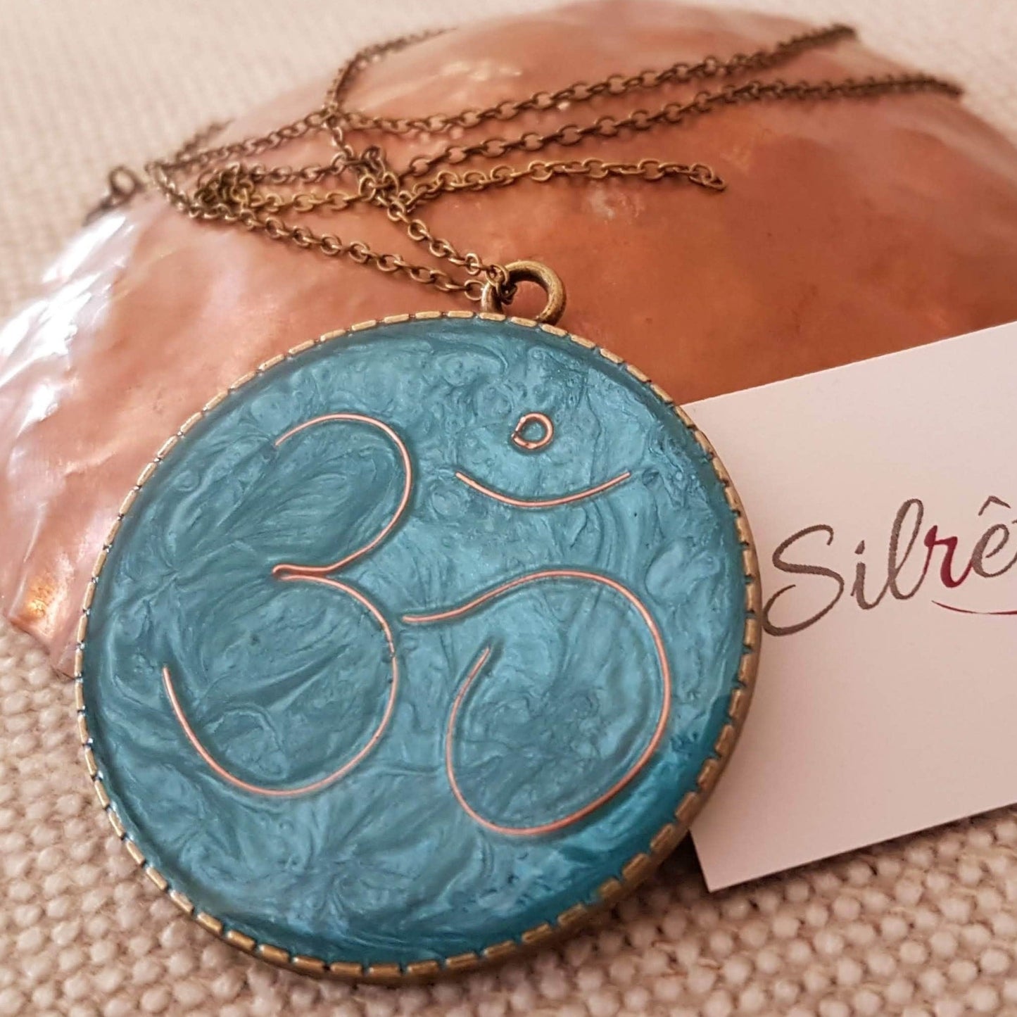 Bronze necklace with hand painted and vitrified round pendant.