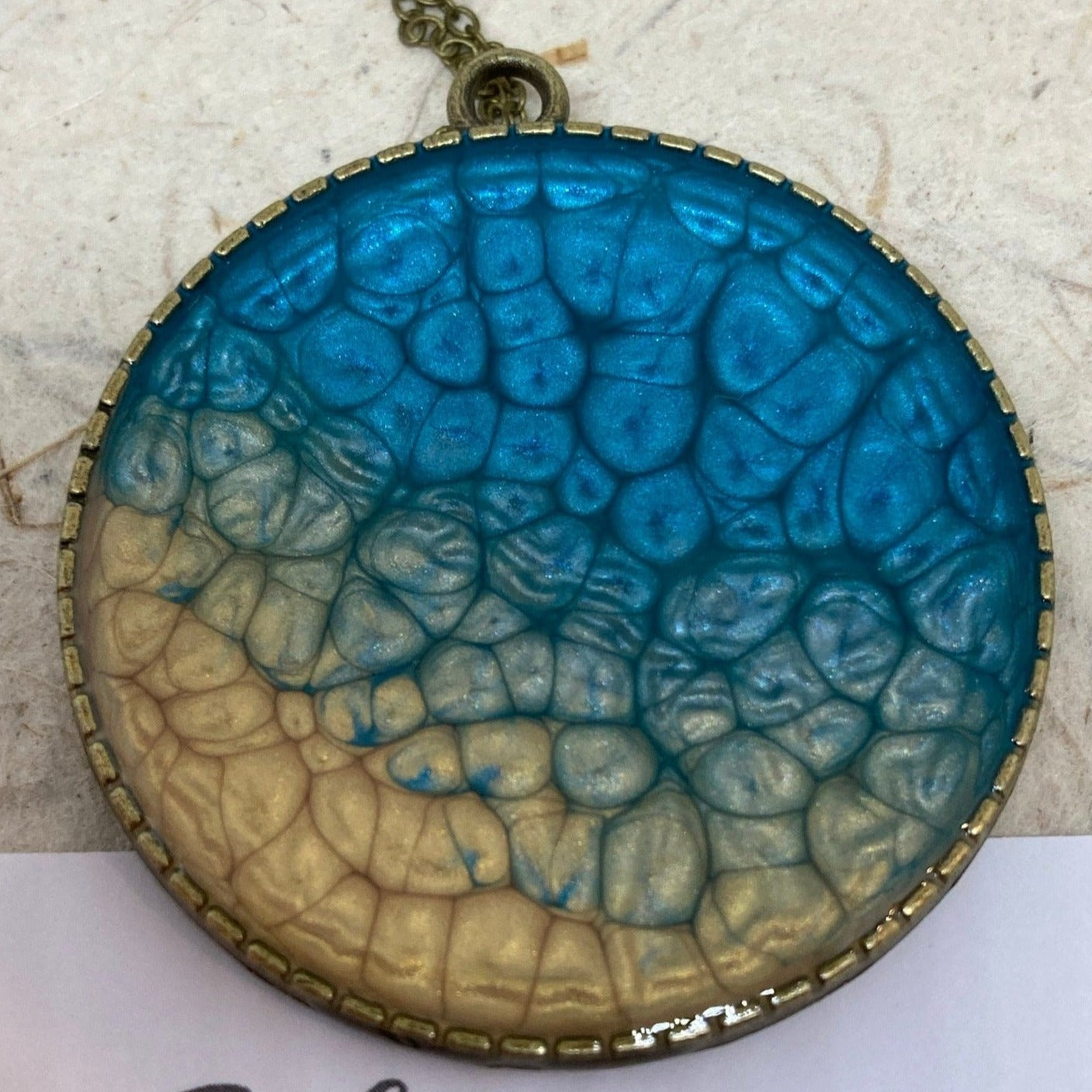 Bronze necklace with hand painted and vitrified round pendant.