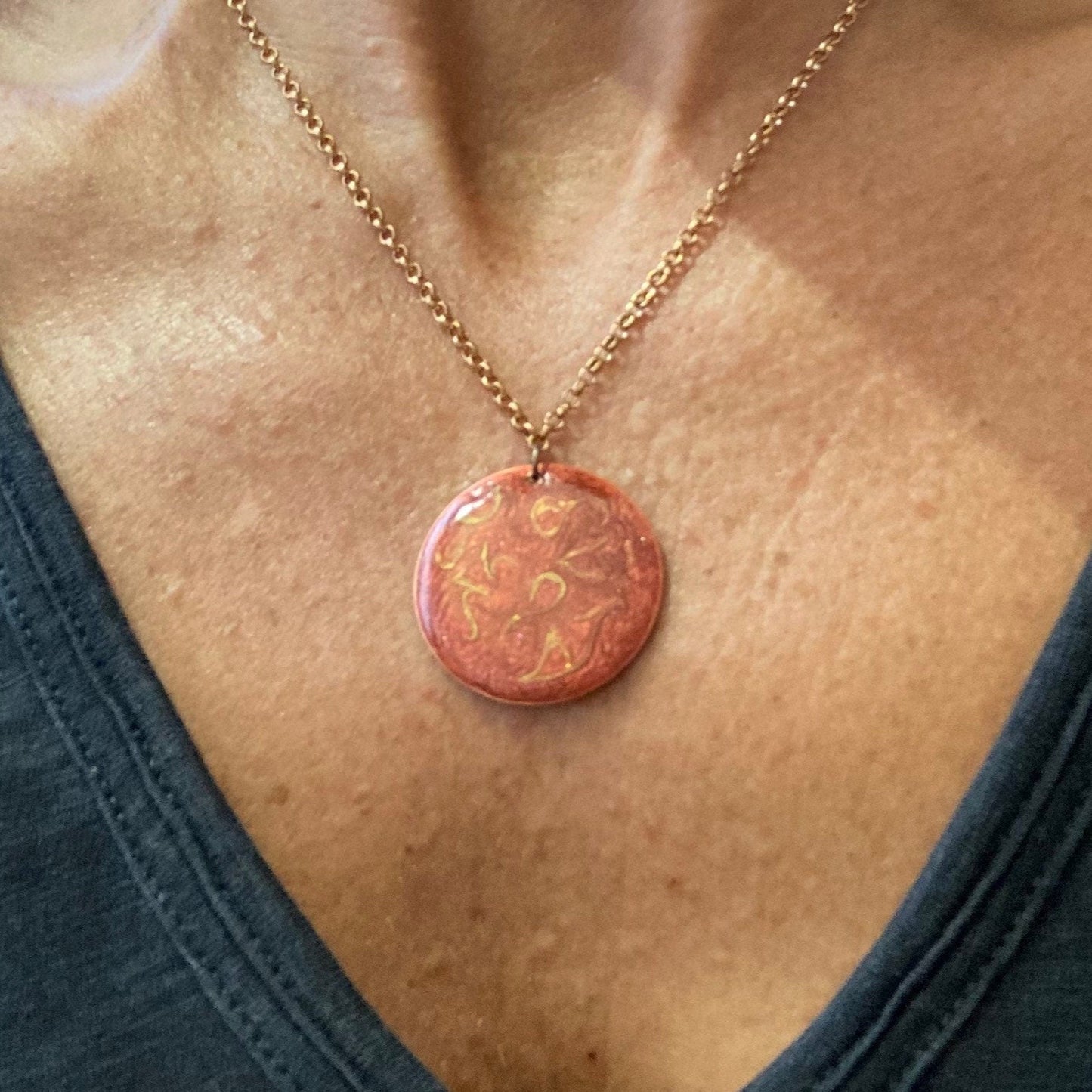 Copper choker necklace with hand painted and vitrified round pendant on both sides.