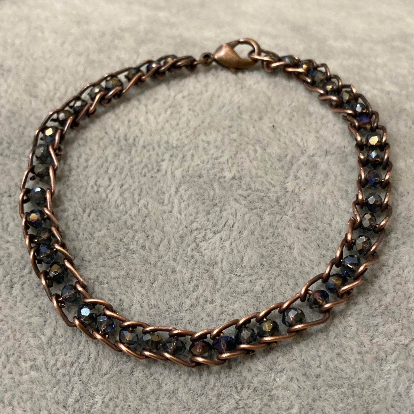 Antiqued copper bracelet, embellished with small crystals