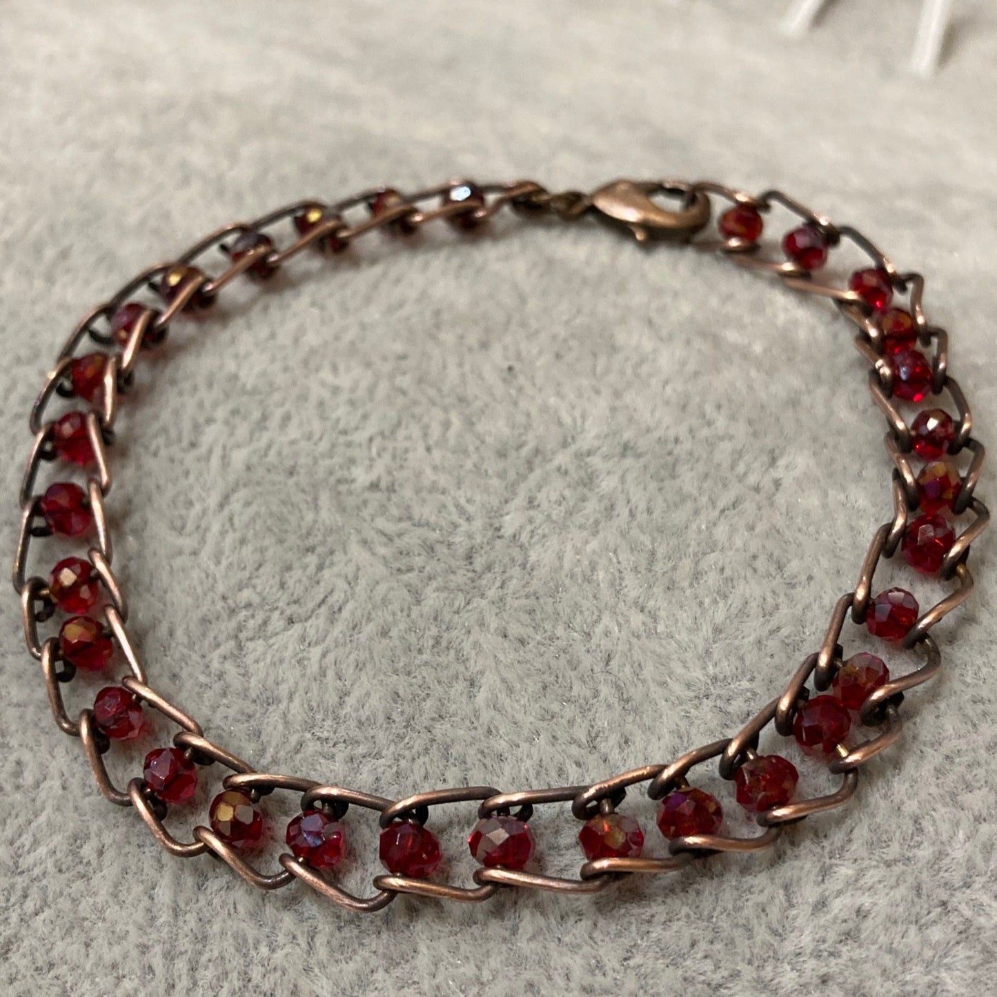 Antiqued copper bracelet, embellished with small crystals