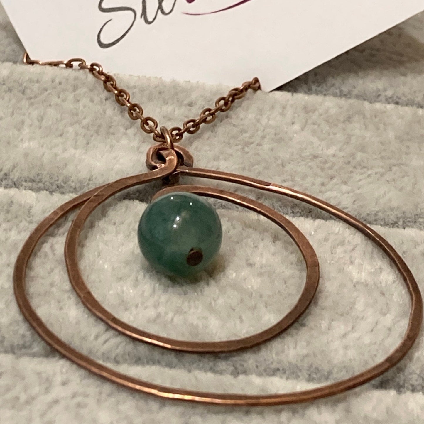 Hammered and antiqued copper pendant, with green agate