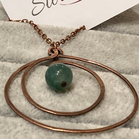 Hammered and antiqued copper pendant, with green agate