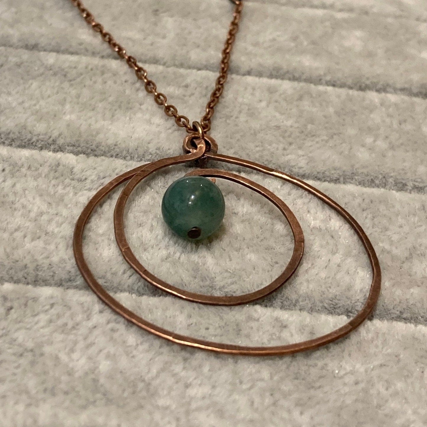 Hammered and antiqued copper pendant, with green agate