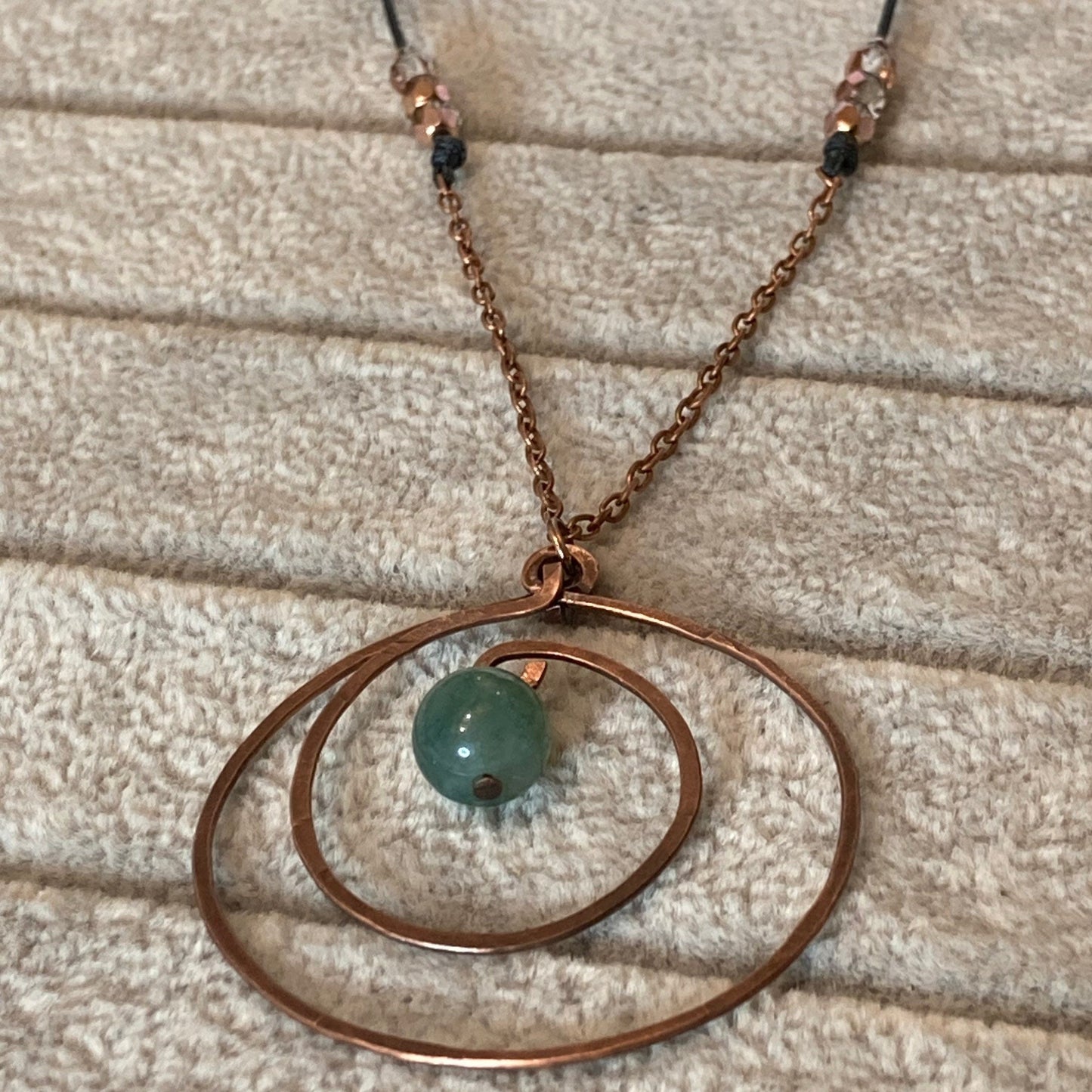 Hammered and antiqued copper pendant, with green agate