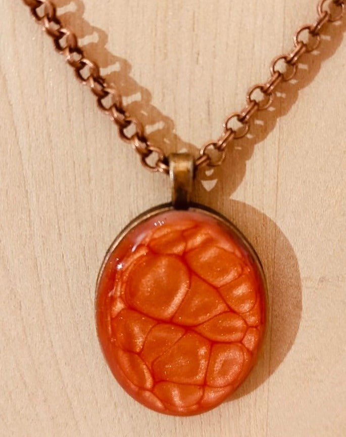 Copper necklace with hand painted and vitrified oval pendant.