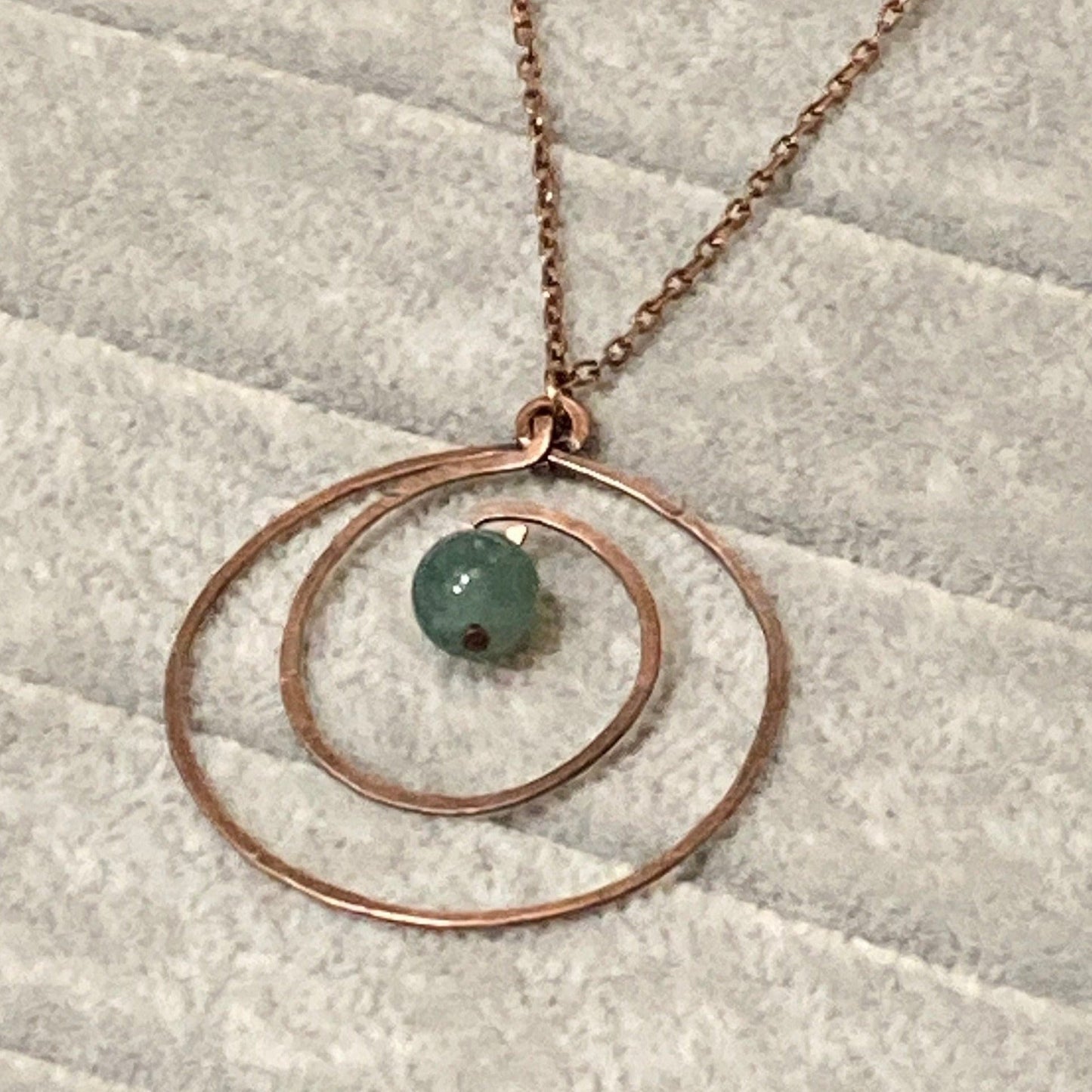 Hammered and antiqued copper pendant, with green agate