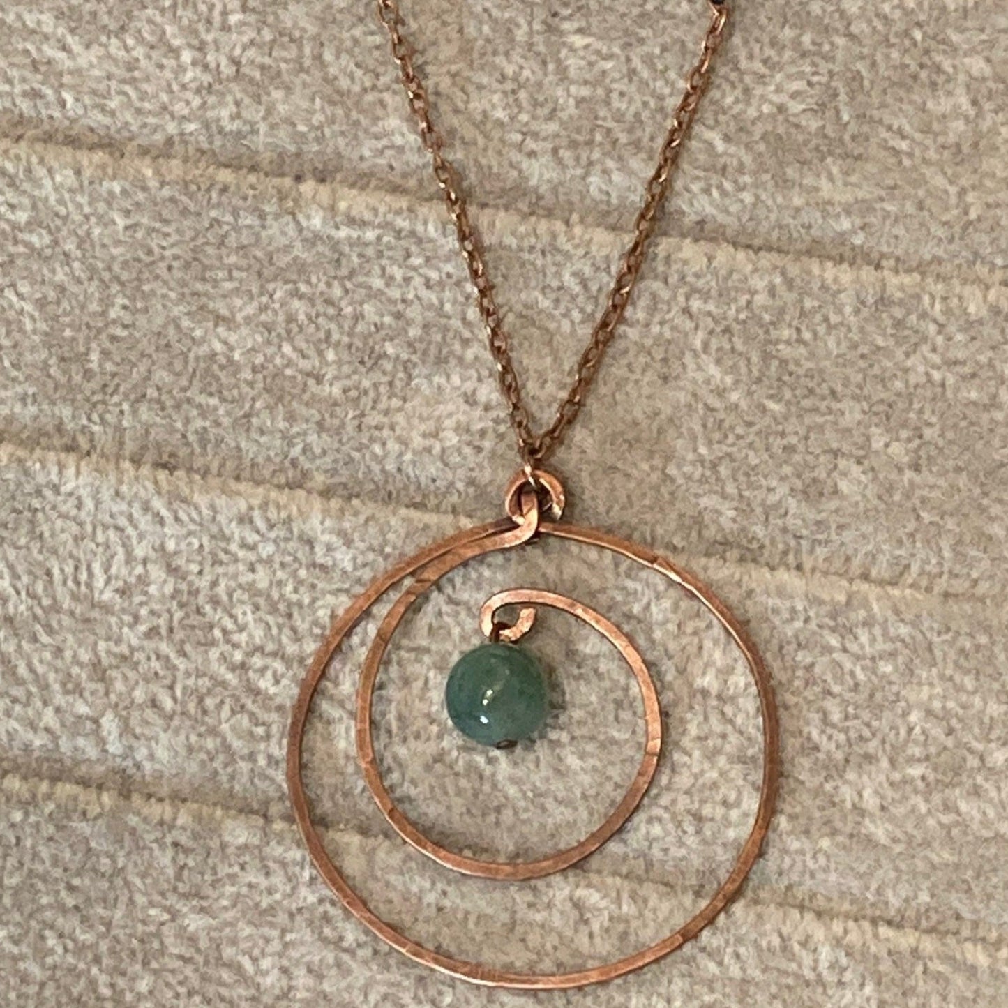 Hammered and antiqued copper pendant, with green agate